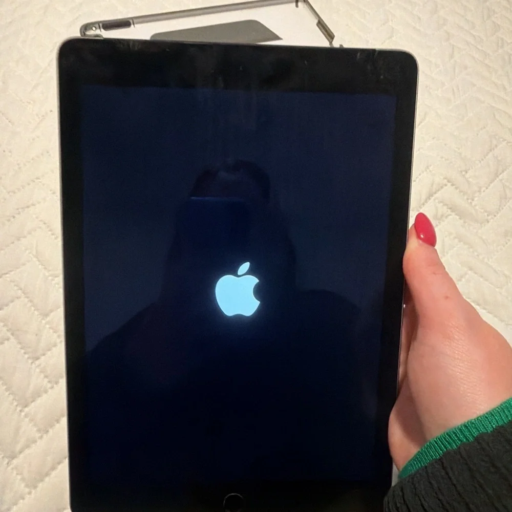 Apple Tablet with Black and Silver Design